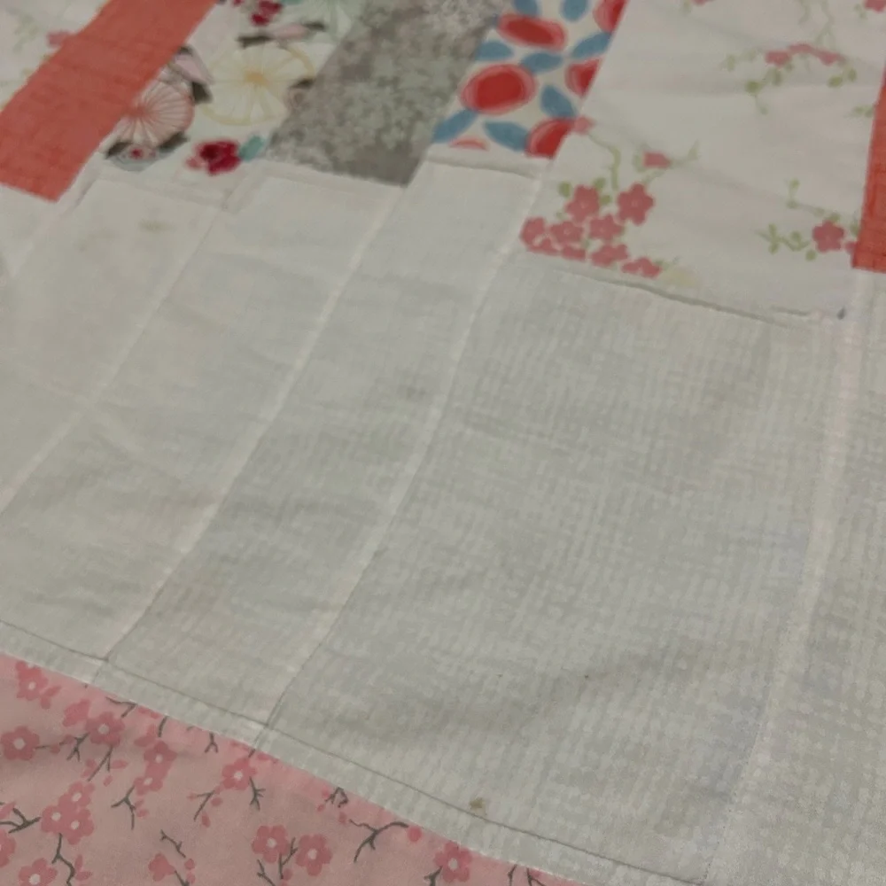 GUC Modern handmade quilt in corals, pinks and greens. Nursery. Needs TLC repair